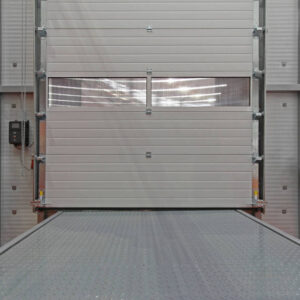Industrial Roll Loading Cargo Door in Warehouse